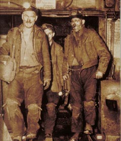 Miners emerging from the cage at the end of a shift 1950. 
Credit: SCRAN